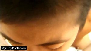 A skinny Asian sucking the smallest dick ever